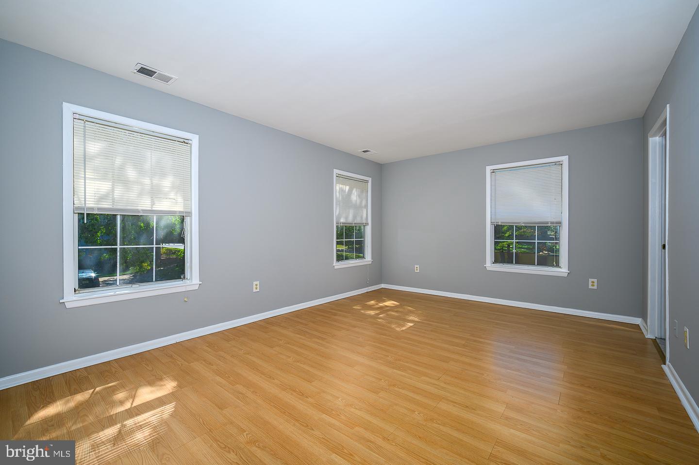115 Cascade Court, Unit 7 Princeton, NJ 08540 - Photo 9 of 27 a view of an empty room with a window