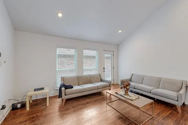 a living room with furniture and a couch