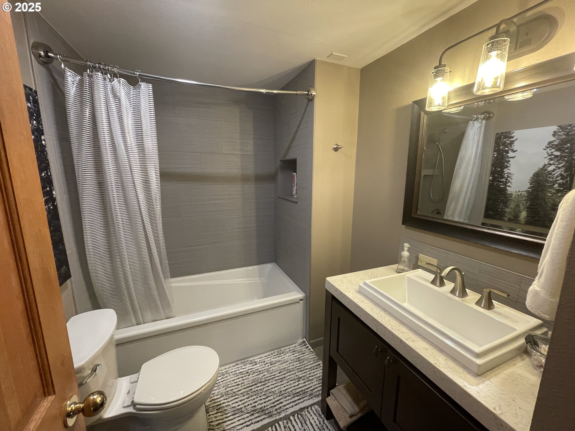 64624 West Frk Lane Joseph, OR 97846 - Photo 18 of 31 a bathroom with a sink a toilet a mirror and shower