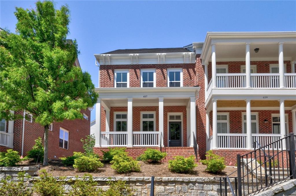 1956 Attell Way Decatur, GA 30033 - Photo 1 of 1 front view of a brick house with a yard