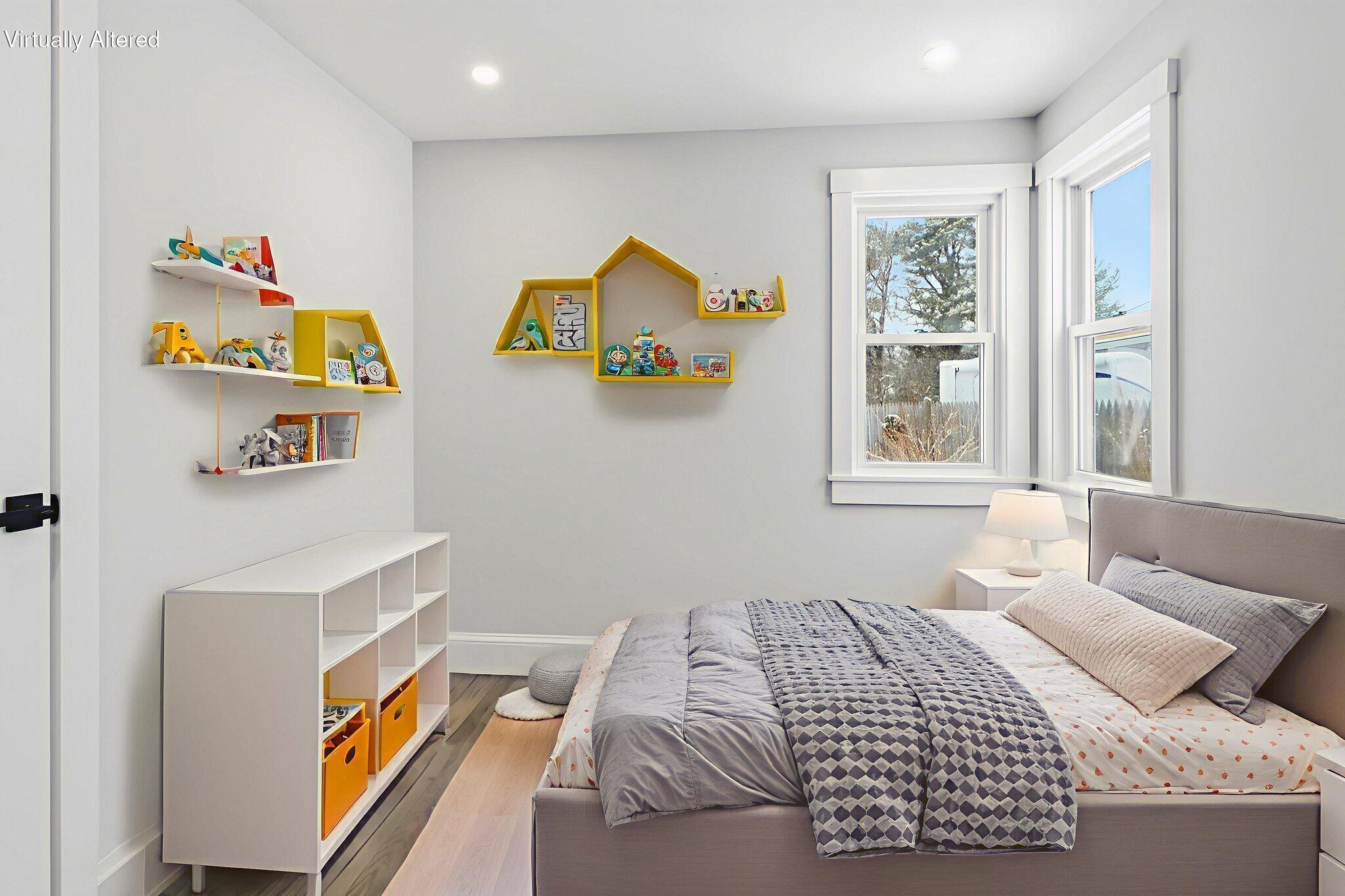 24 Hazelmoor Road South Yarmouth, MA 02664 - Photo 15 of 19 a bedroom with a bed and a window