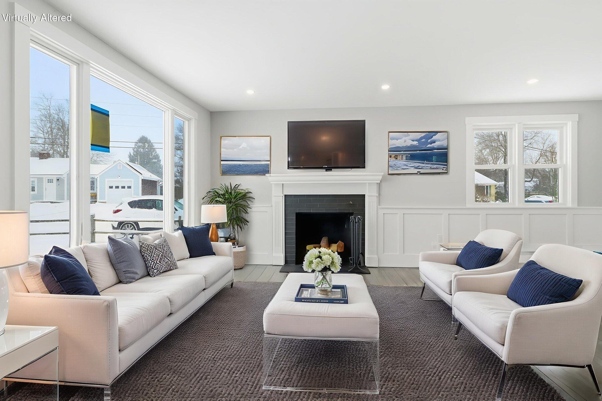 24 Hazelmoor Road South Yarmouth, MA 02664 - Photo 4 of 19 a living room with furniture and a fireplace