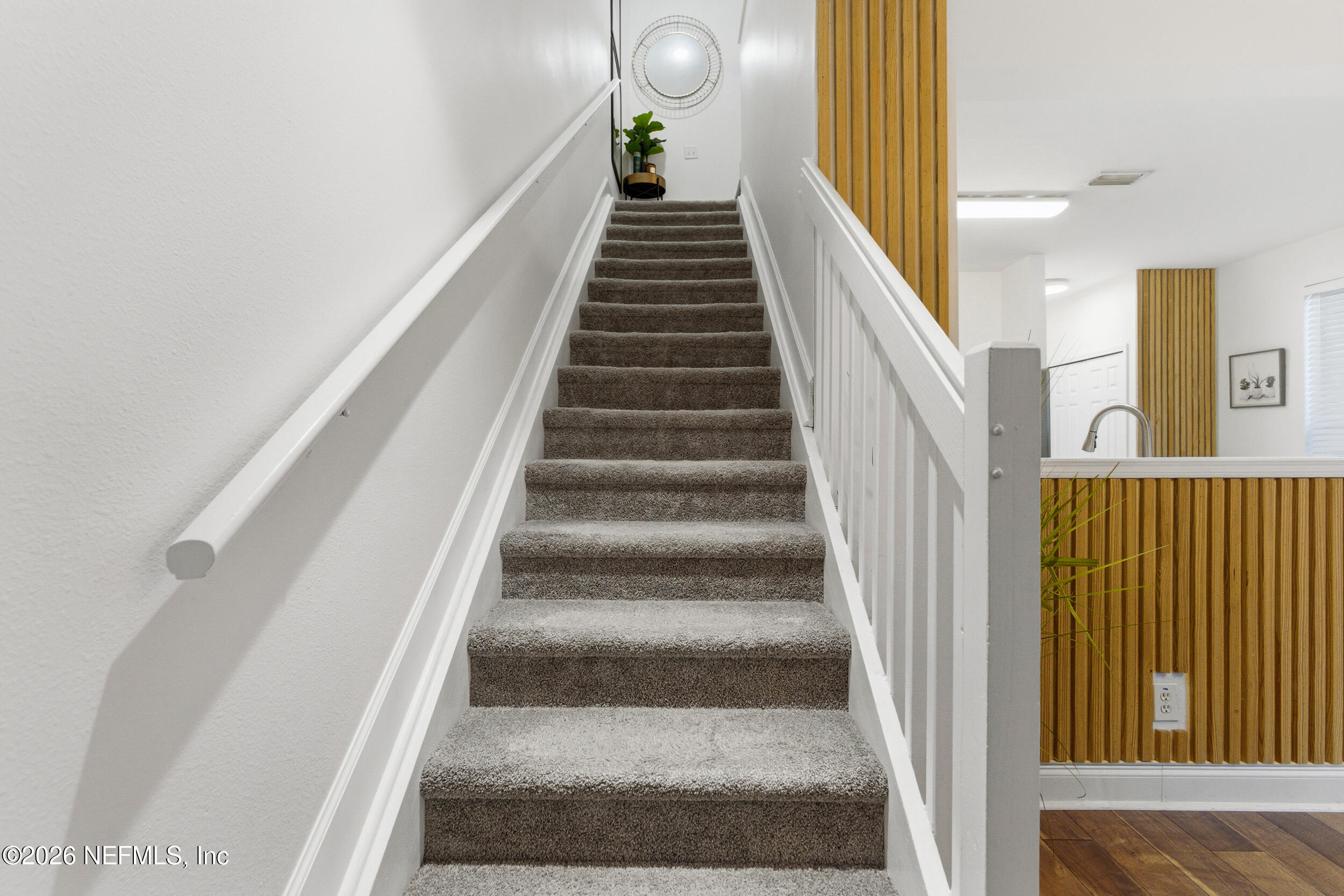 7990 Baymeadows Road, Unit 1801 Jacksonville, FL 32256 - Photo 16 of 48 a view of entryway and hall with wooden floor