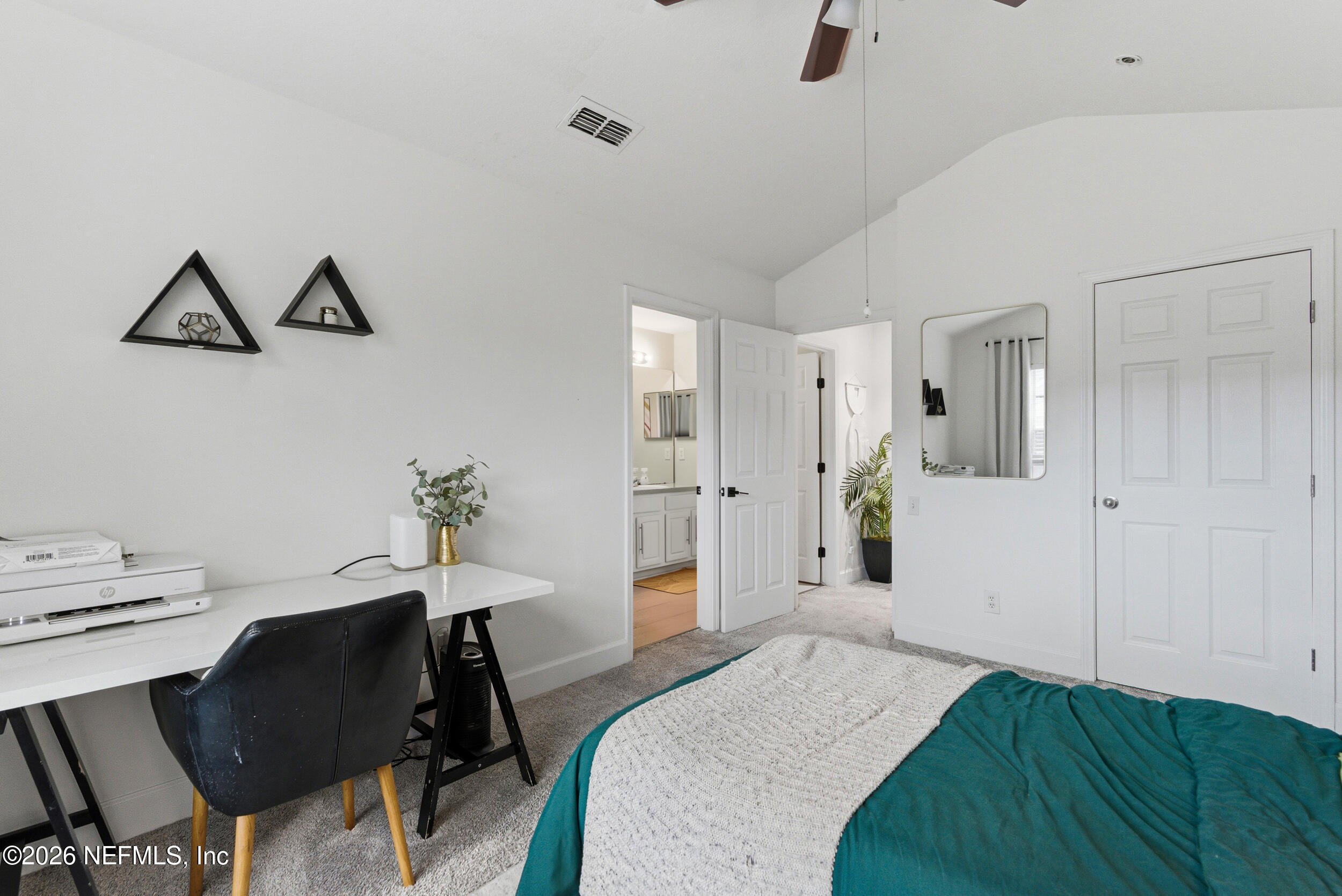 7990 Baymeadows Road, Unit 1801 Jacksonville, FL 32256 - Photo 27 of 48 a bedroom with a bed and a desk