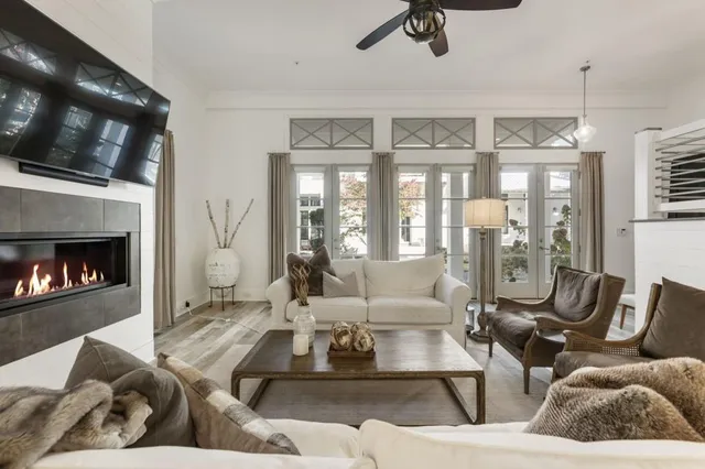 a living room with furniture or outdoor view and a fireplace