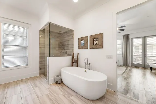 a utility room with cabinets washer and dryer