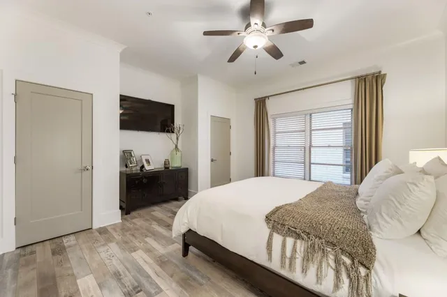 a view of a large building with a street