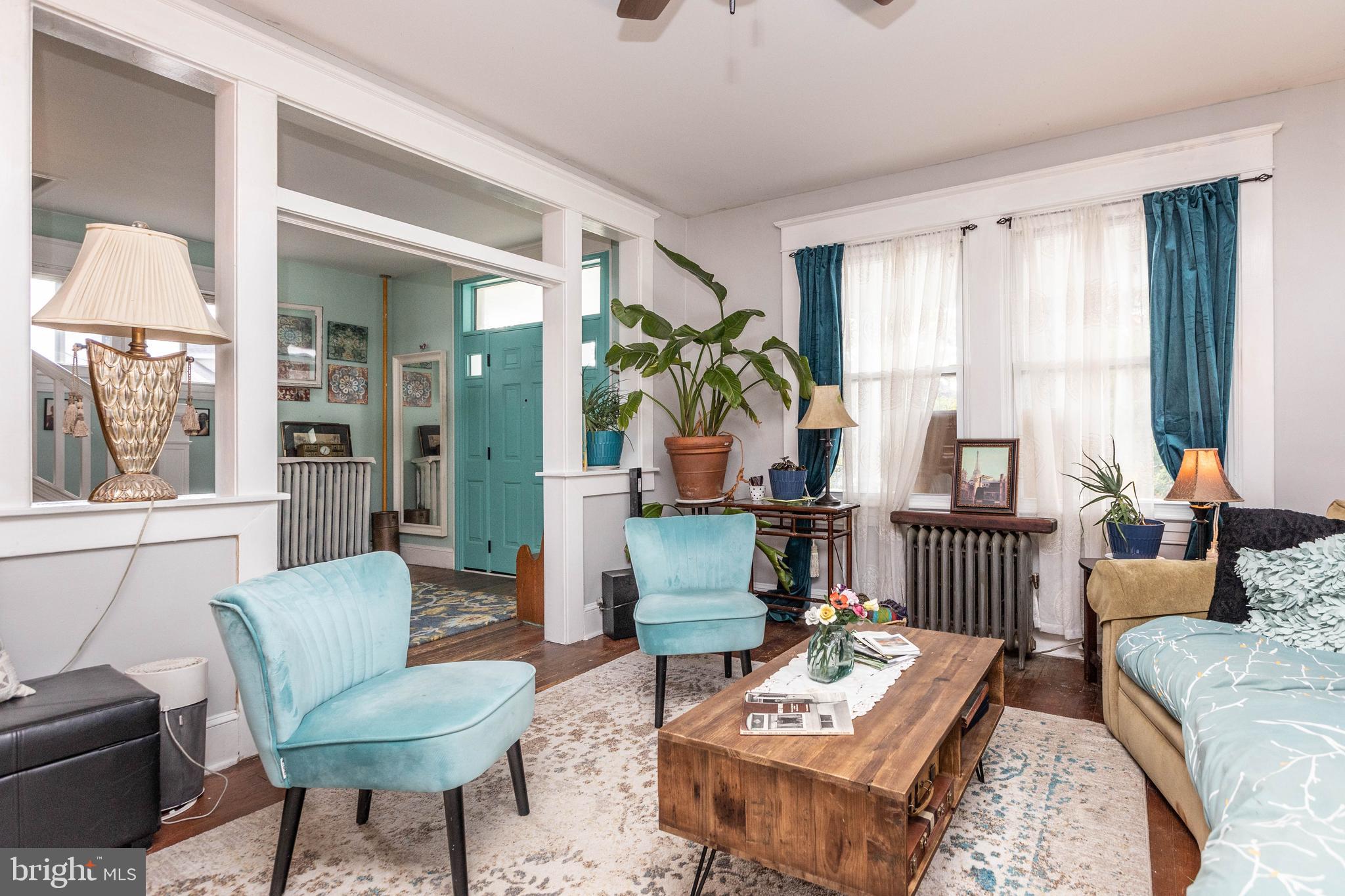 4223 Harcourt Road Baltimore, MD 21214 - Photo 4 of 36 Cozy living room with foyer beyond.