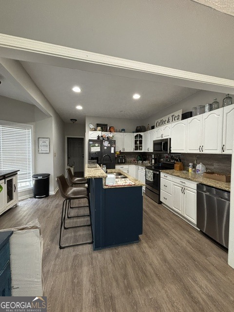 771 Hamilton Road Concord, GA 30206 - Photo 6 of 30 a large kitchen with lots of counter space and stainless steel appliances