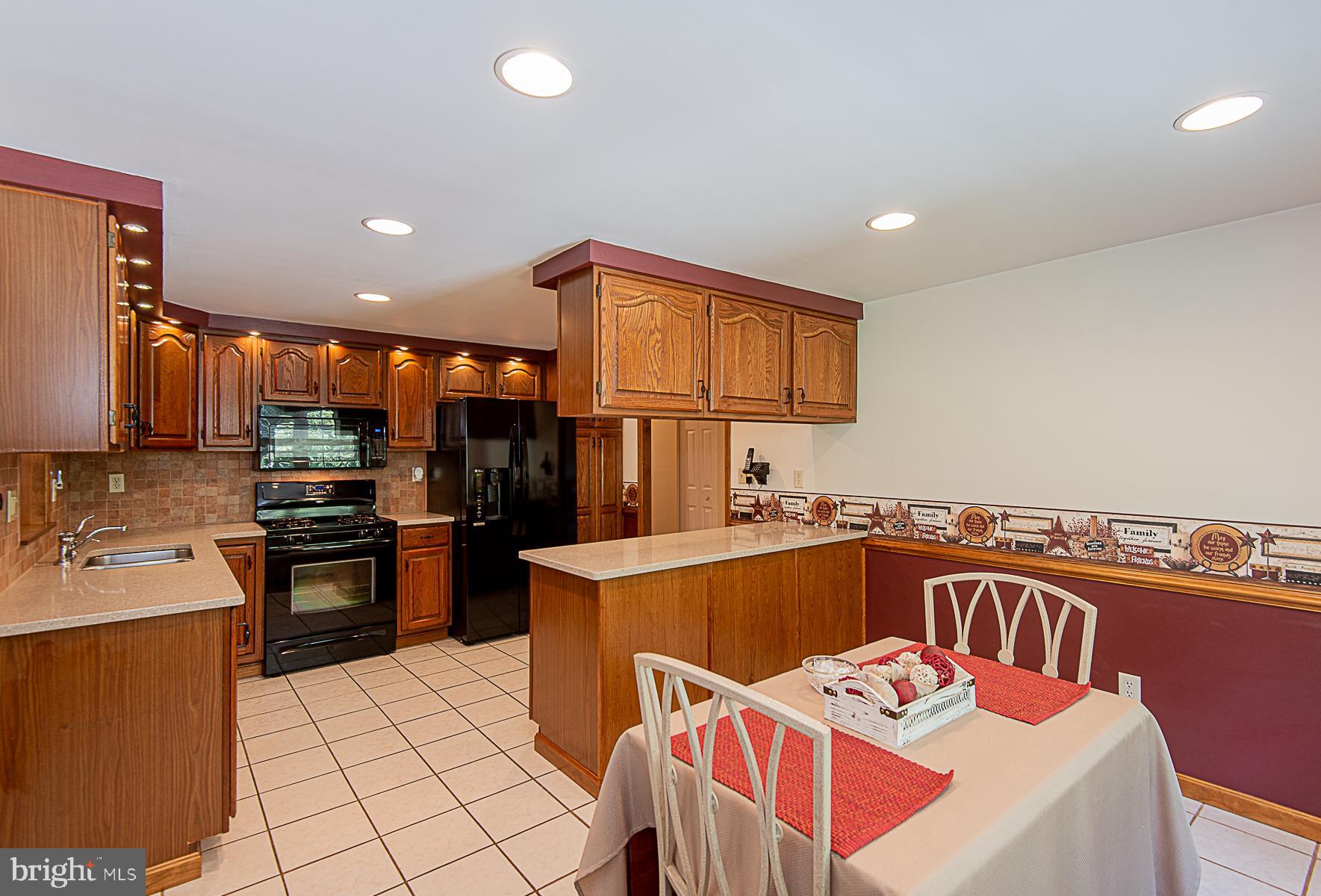 8309 Risha Drive Severn, MD 21144 - Photo 14 of 34 Recessed lighting