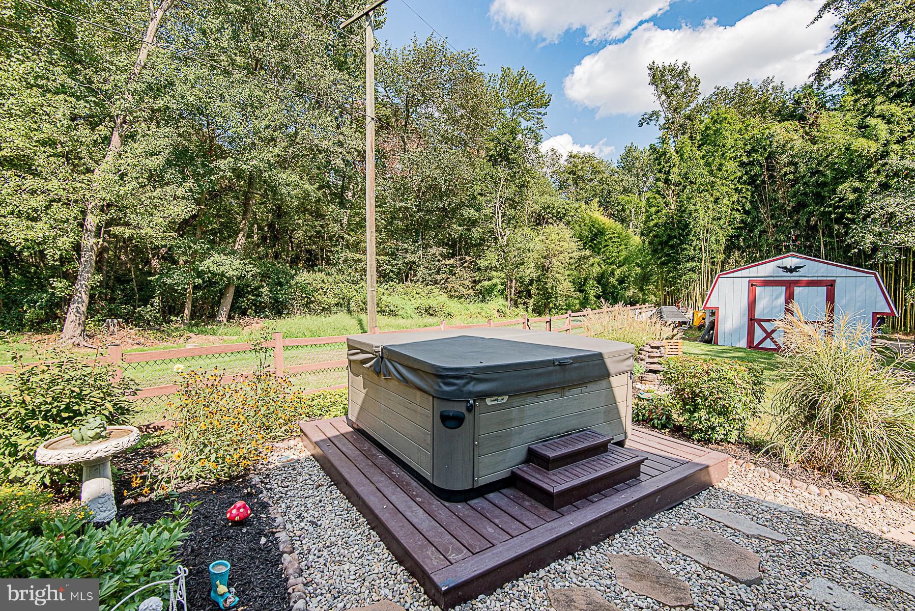 8309 Risha Drive Severn, MD 21144 - Photo 7 of 34 Hot tub conveys with home!