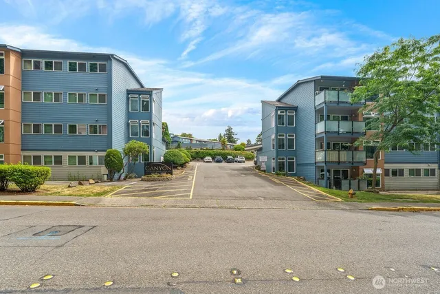 a view of city with tall buildings