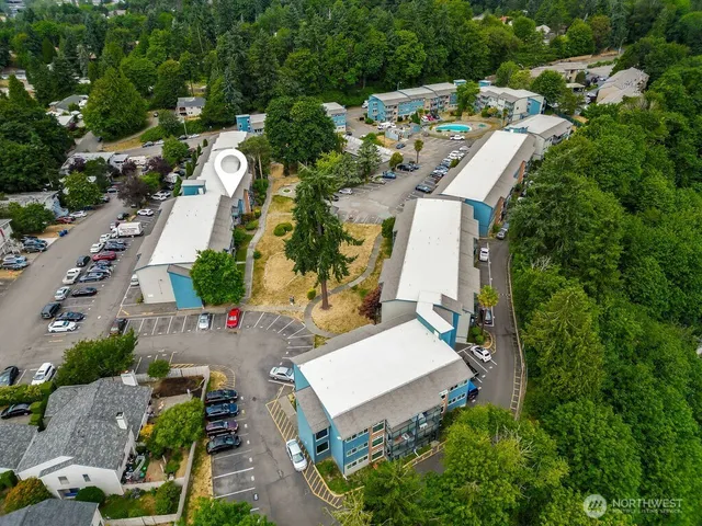 an aerial view of a house with outdoor space
