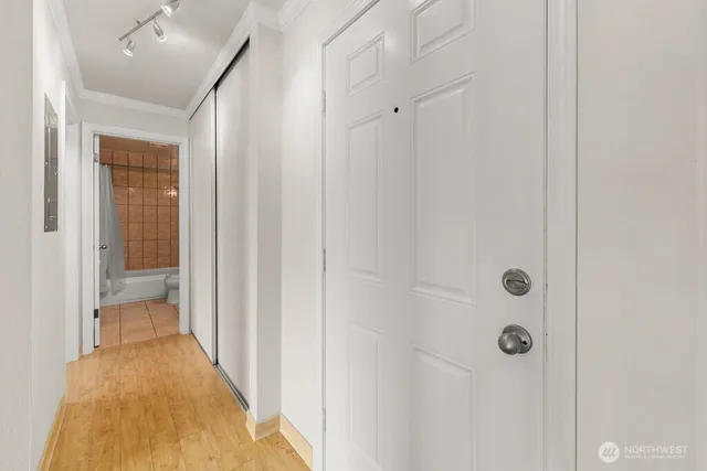 a view of a bathroom from a hallway