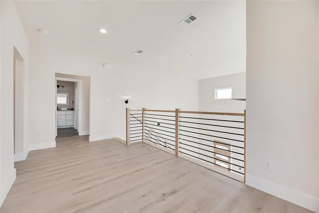 a view of a livingroom with wooden floor