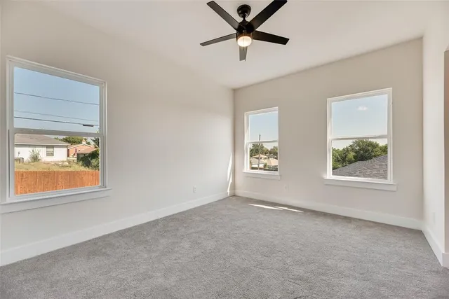 an empty room with windows