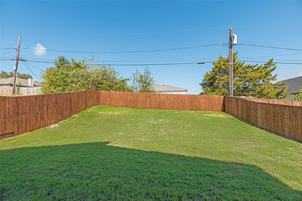 6046 Plum Dale Road Dallas, TX 75241 - Photo 26 of 27 a view of a backyard