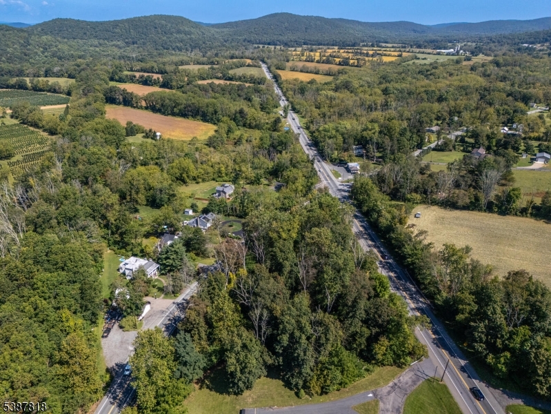 283 Highway 31 Washington, NJ 07882 - Photo 2 of 11 an aerial view of residential houses with outdoor space and trees
