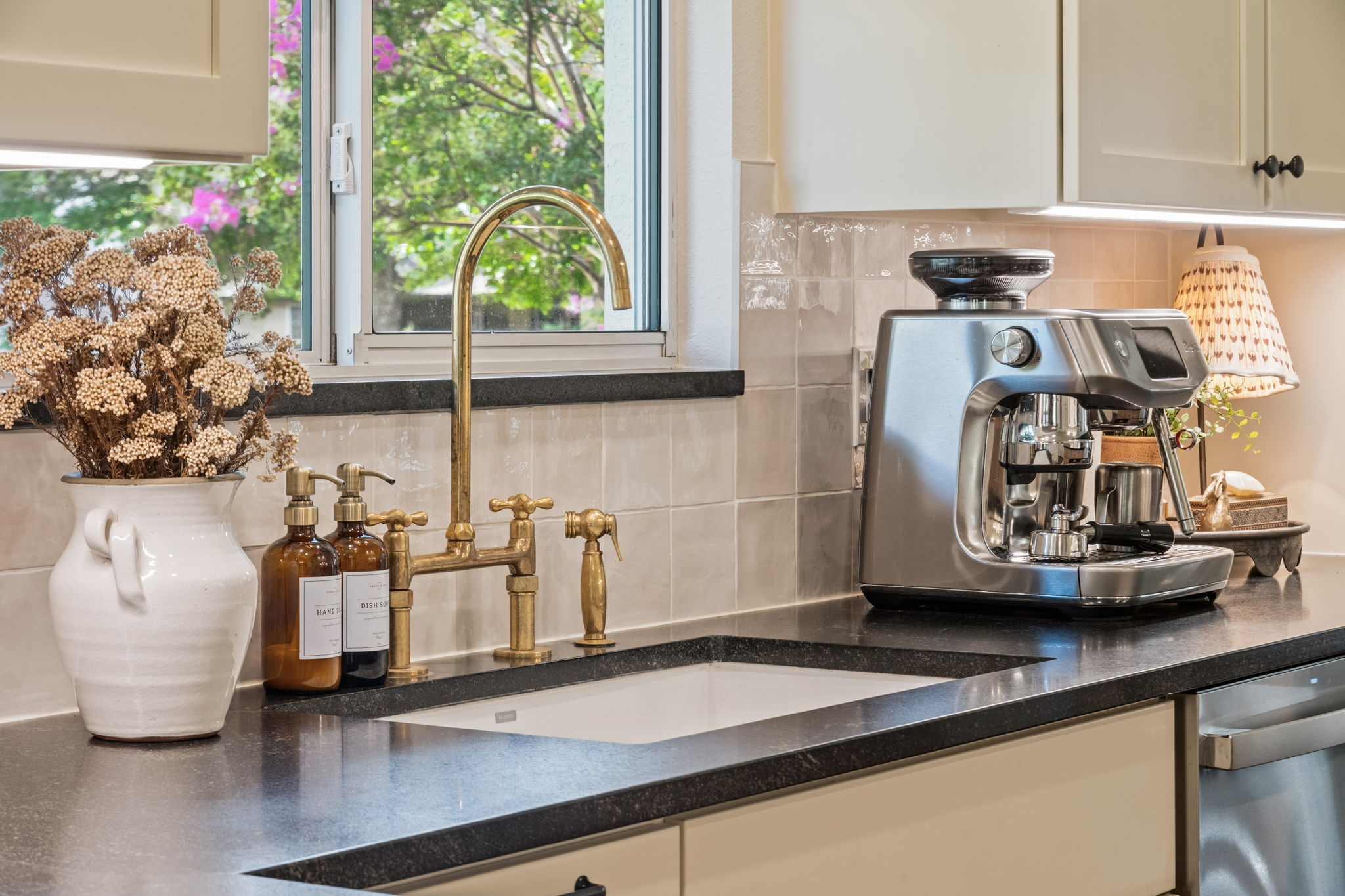 118 Cold Springs Drive Georgetown, TX 78633 - Photo 21 of 40 Gleaming counters and a brass faucet create an inviting and functional kitchen space.