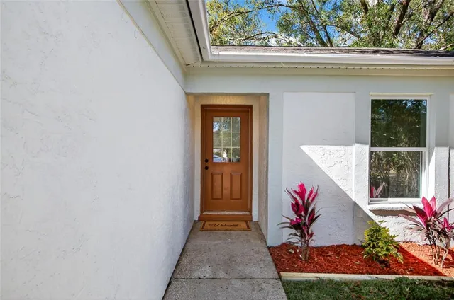 a front view of a house with a porch