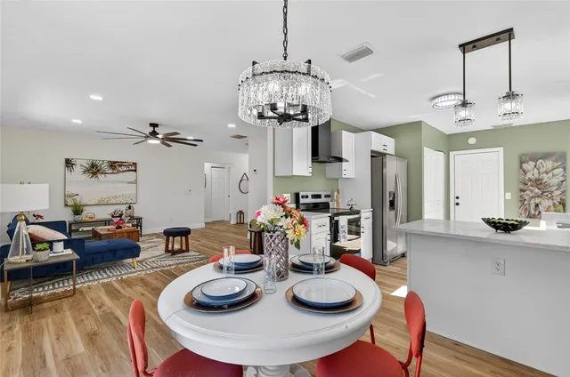 a view of a dining room with furniture