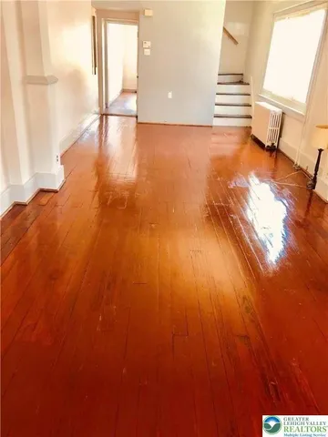 a view of an empty room and window