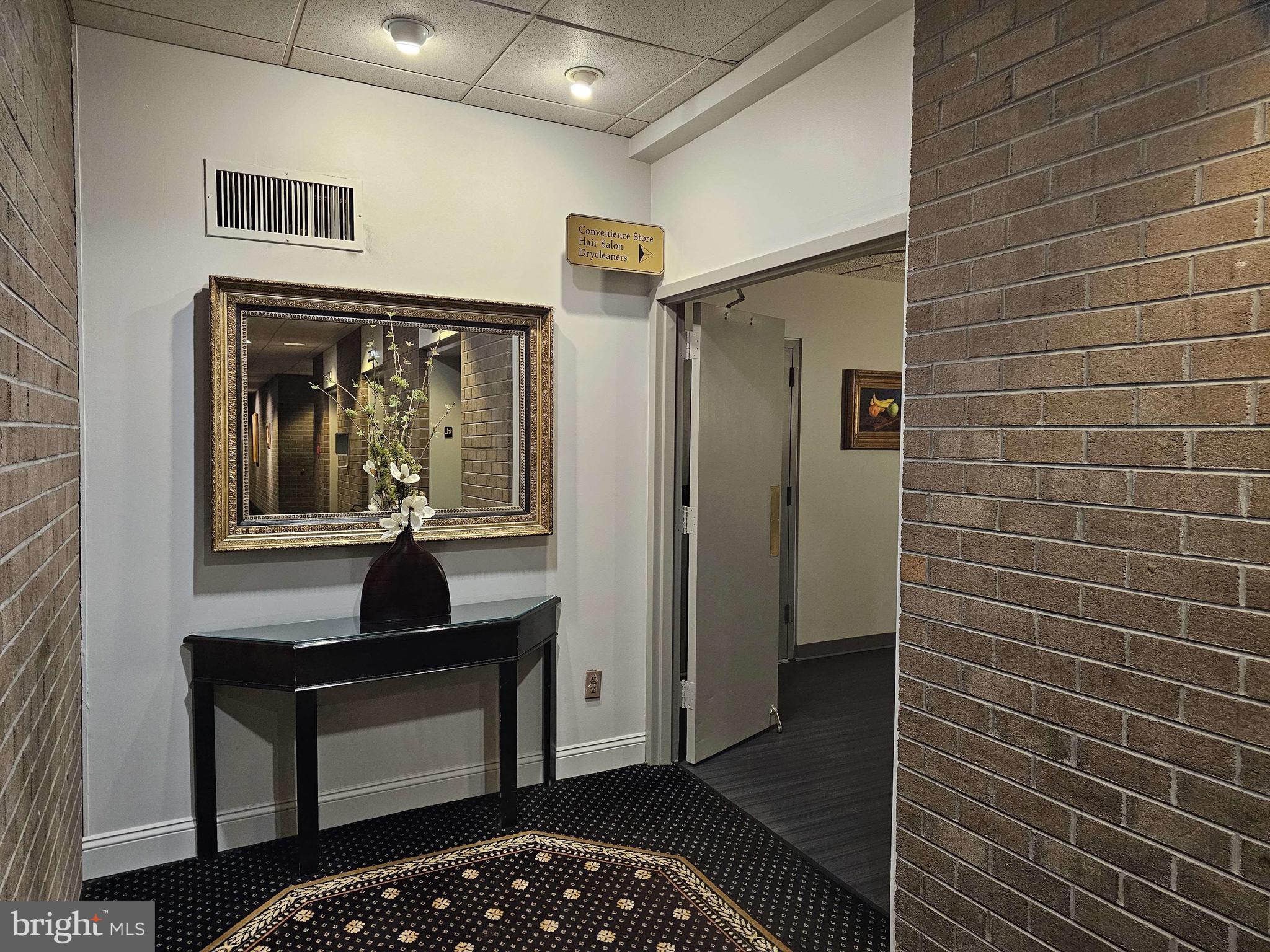 1800 Old Meadow Road, Unit 621 McLean, VA 22102 - Photo 18 of 28 a bathroom with a sink and a mirror