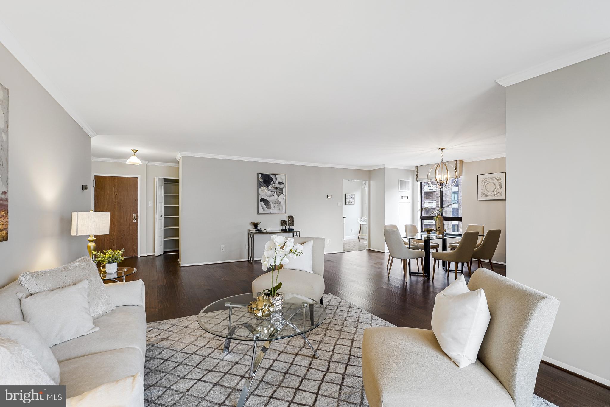1800 Old Meadow Road, Unit 621 McLean, VA 22102 - Photo 28 of 28 a living room with furniture and wooden floor