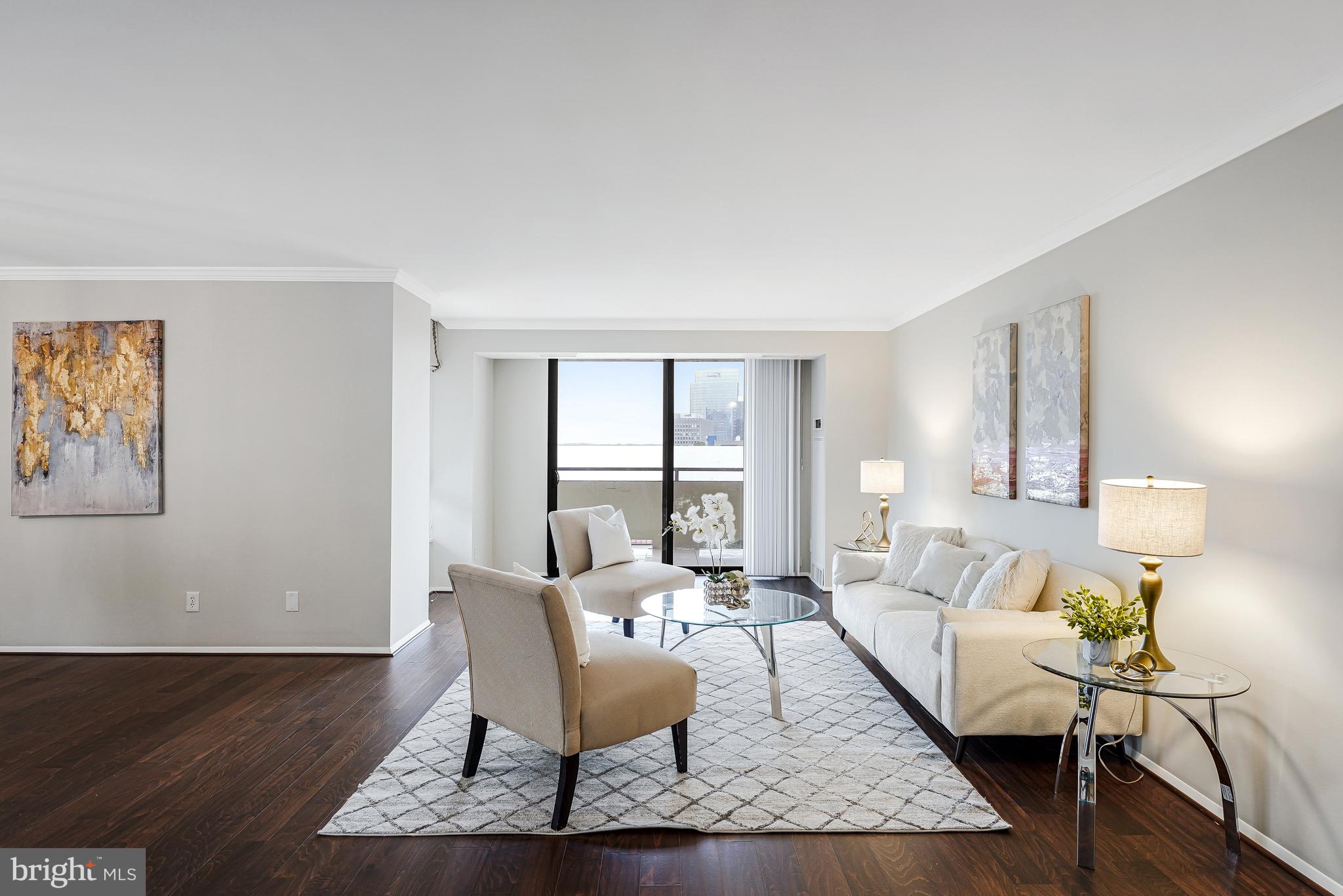1800 Old Meadow Road, Unit 621 McLean, VA 22102 - Photo 5 of 28 a living room with furniture rug and window