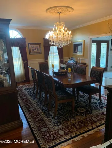 a view of entry way with wooden floor