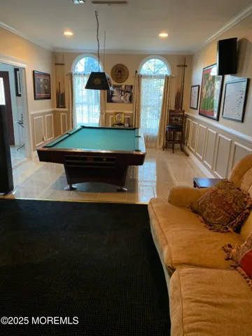 a kitchen with stainless steel appliances granite countertop a sink and a stove