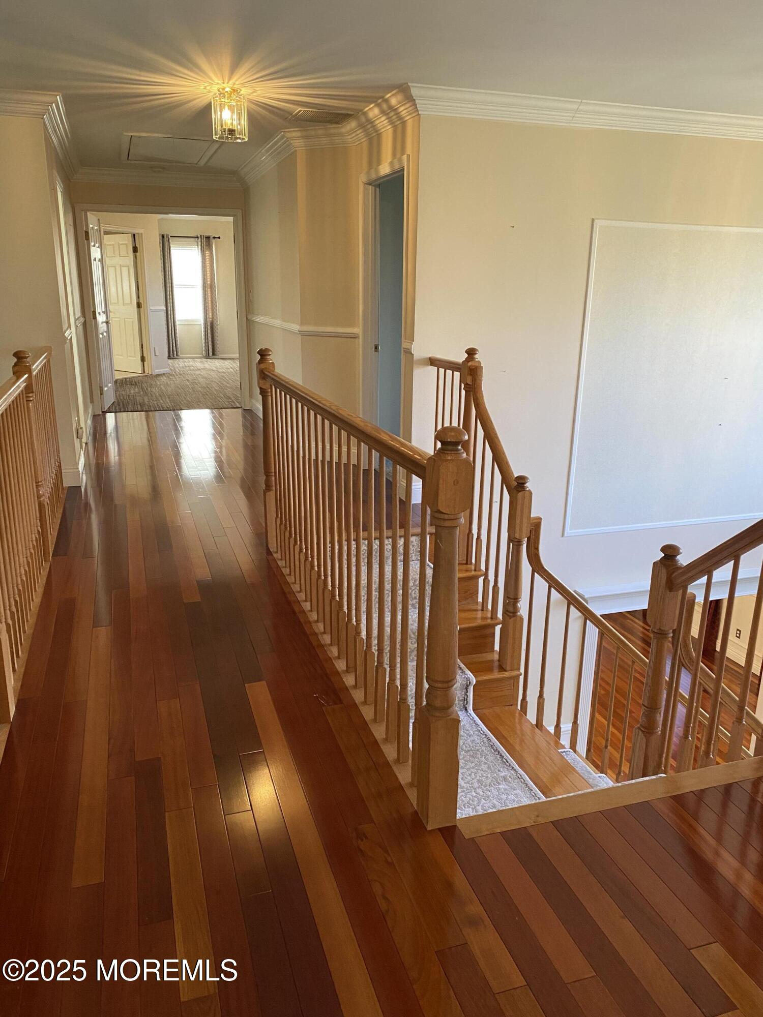 41 Church Road Howell, NJ 07731 - Photo 23 of 69 a view of entryway with stairs and wooden floor