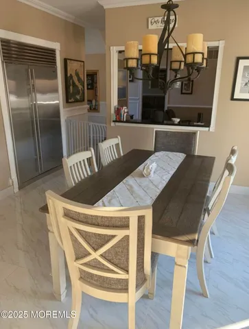 a view of staircase with railing and a rug