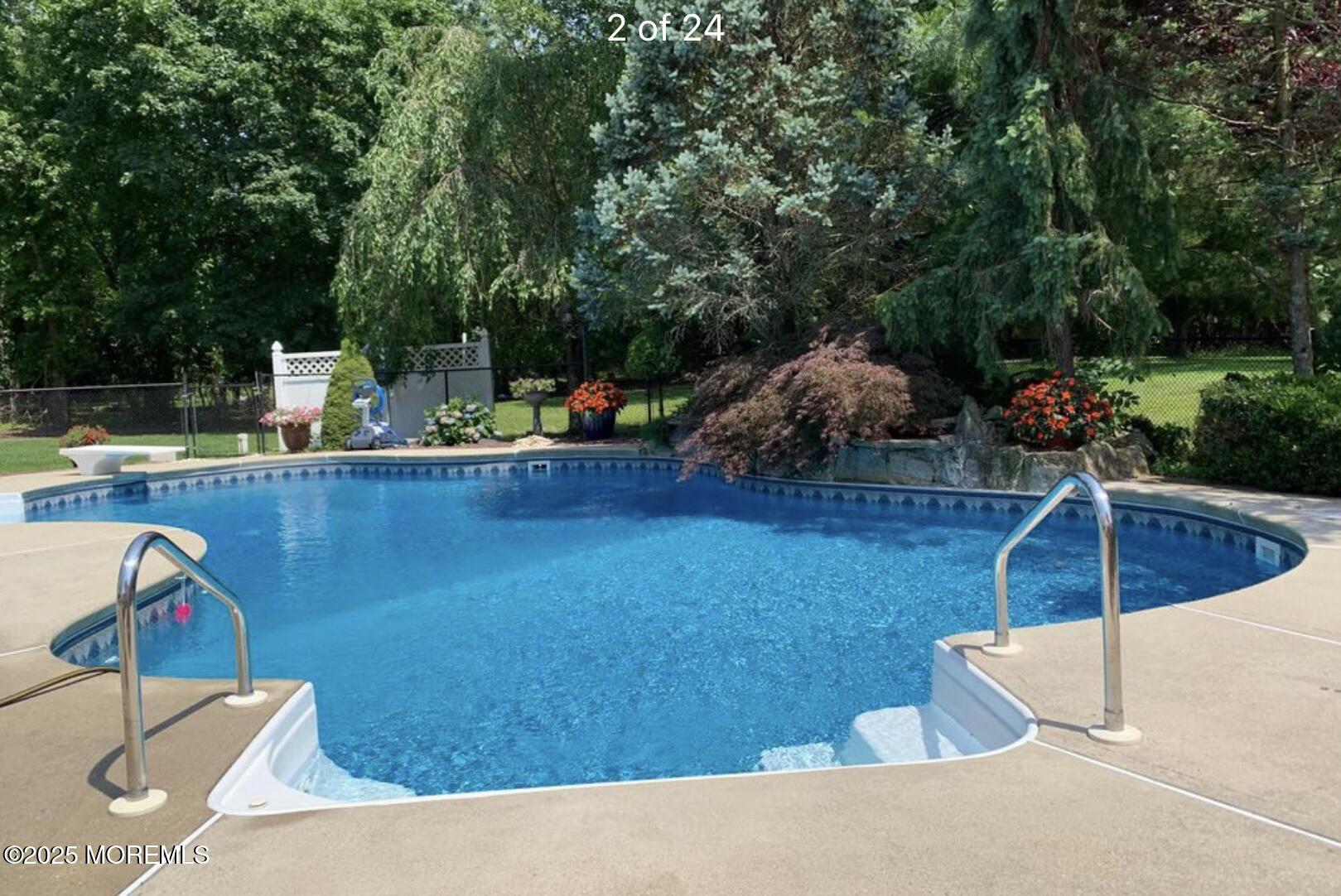 41 Church Road Howell, NJ 07731 - Photo 48 of 69 a view of a swimming pool with a patio and a yard