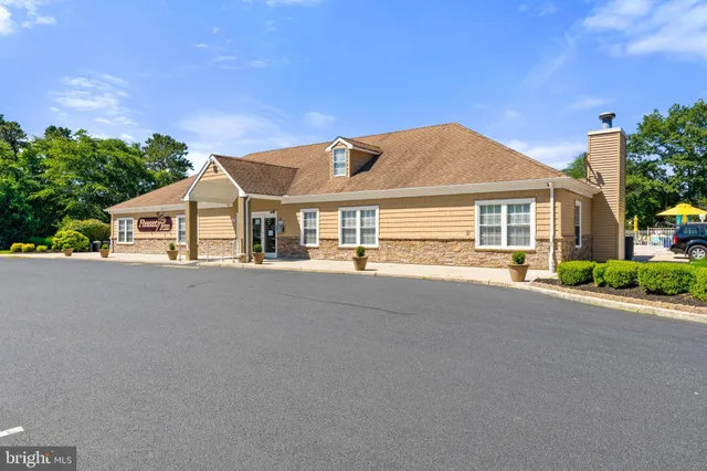 a front view of house with yard