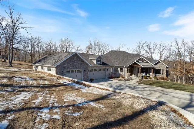 $950,000 | 275 Quiet Meadows Drive, Linn Creek, MO 65052