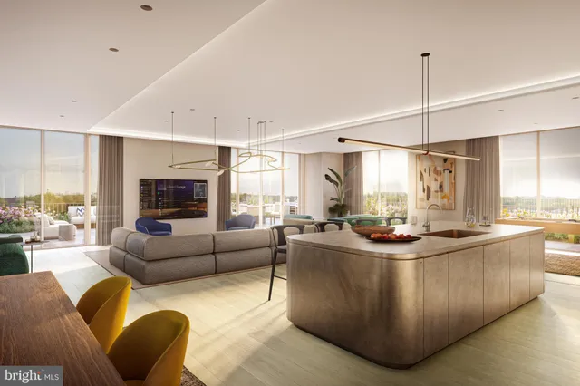 a living room with furniture a couch and a chandelier