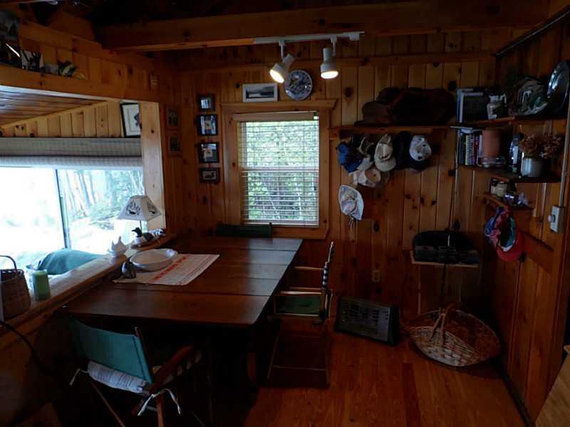 102 Sand Cv Road Princeton, ME 04668 - Photo 22 of 26 Dining Room. Camp dining area.
