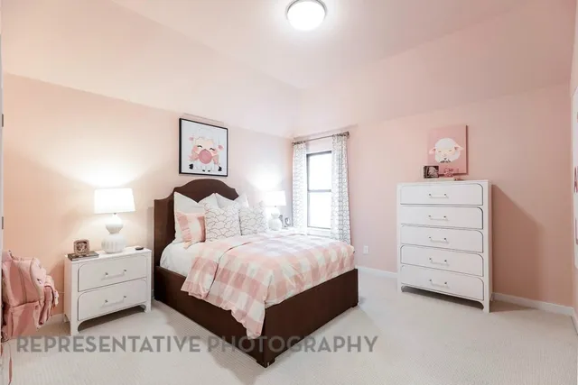 a living room with furniture gym equipment and a large window