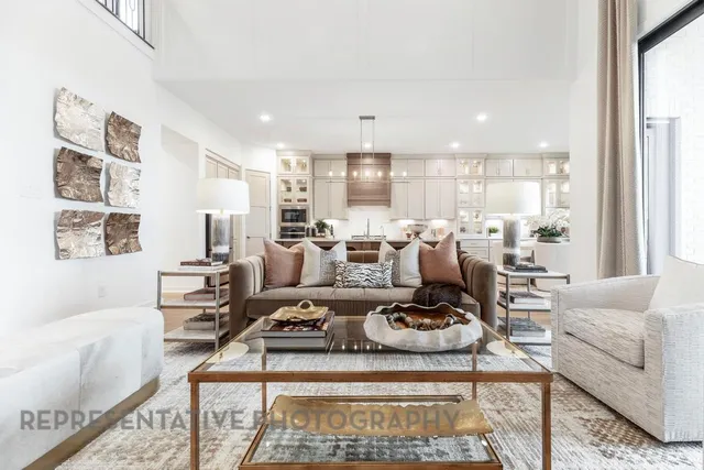 a living room with furniture and a table