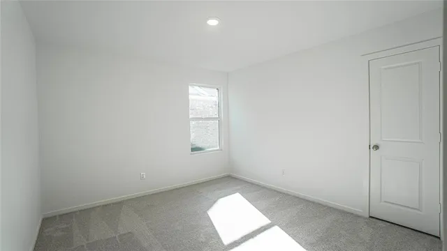 a view of balcony with wooden fence