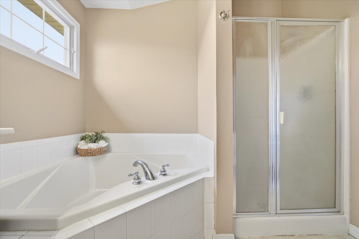 3255 Fire Fly Court Normal, IL 61761 - Photo 14 of 25 a bathroom with a tub and sink