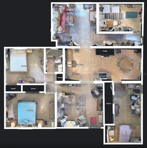 a view of a living room with stainless steel appliances