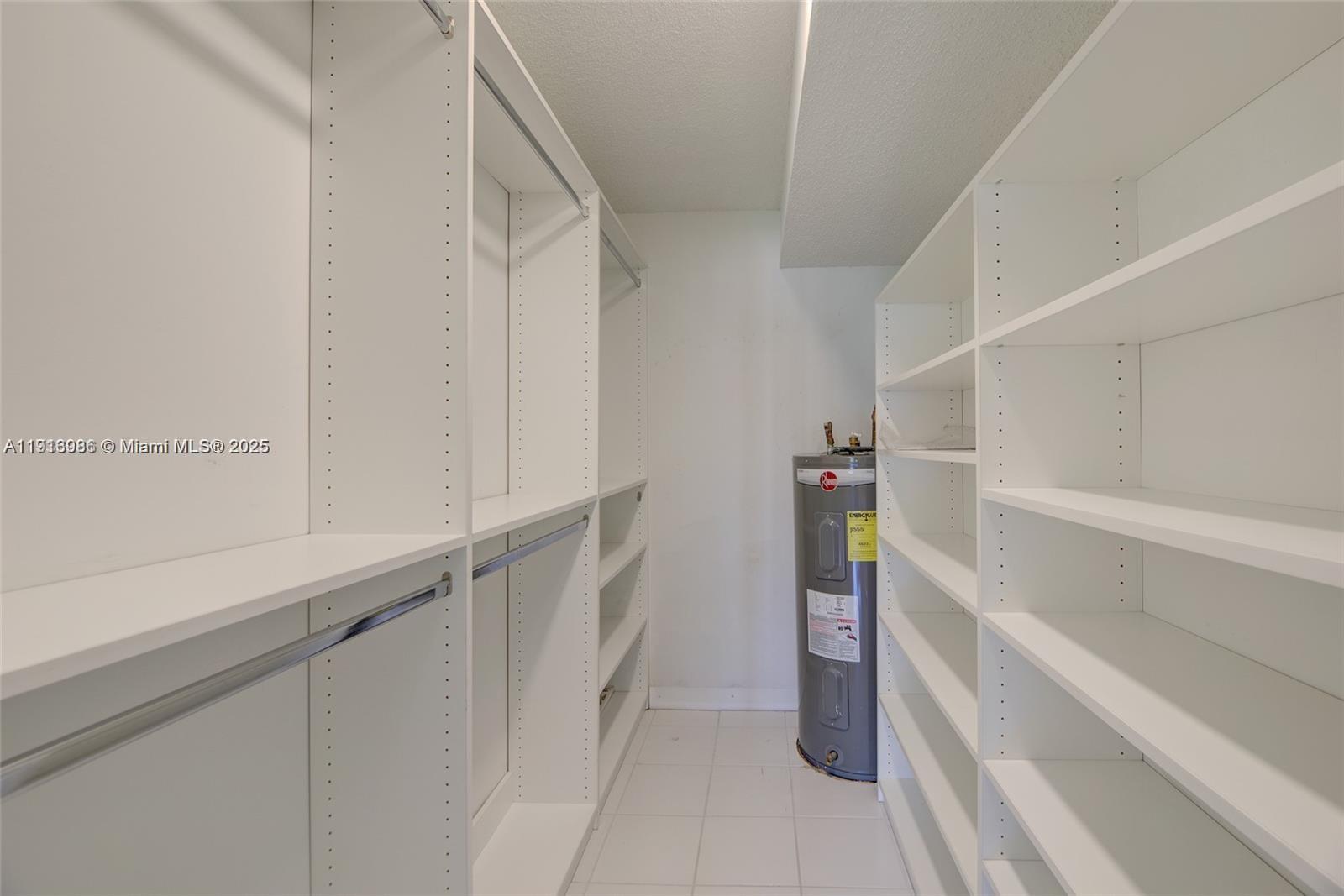 31 Cortez Way, Unit 543 Davie, FL 33324 - Photo 21 of 36 a view of walk in closet