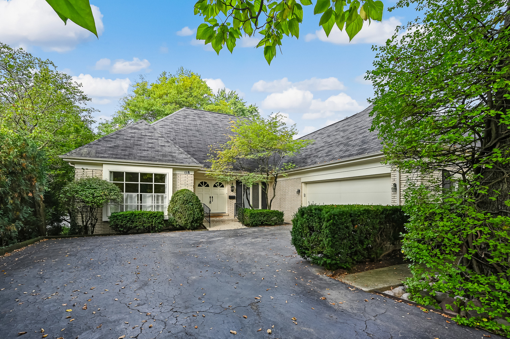 118 North Grant Street Hinsdale, IL 60521 - Photo 1 of 30 a view of a house with potted plants