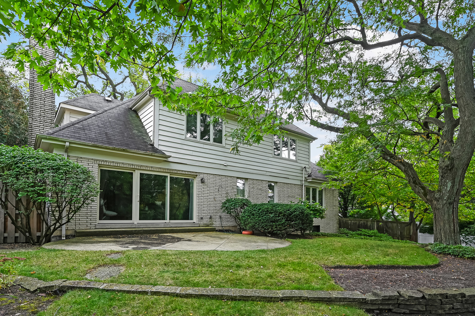 118 North Grant Street Hinsdale, IL 60521 - Photo 30 of 30 a house that has a tree in front of it