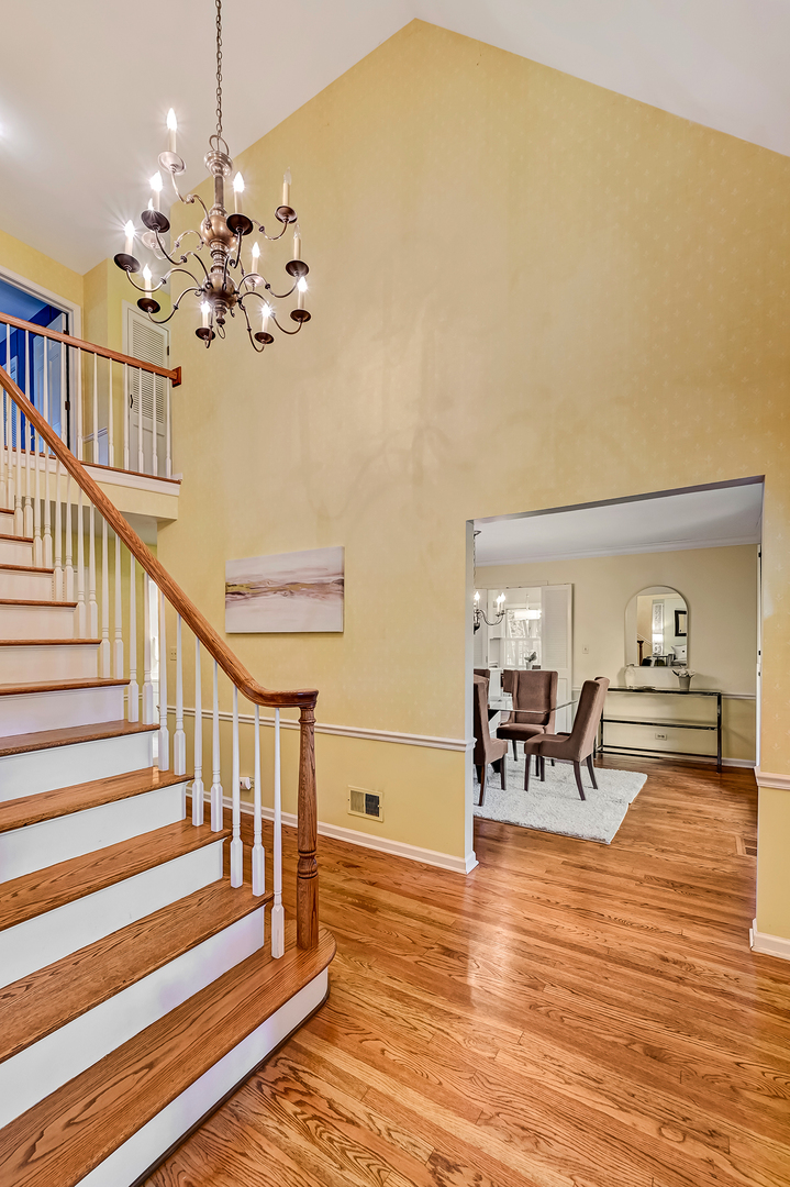 118 North Grant Street Hinsdale, IL 60521 - Photo 3 of 30 a view of a dining room with furniture and wooden floor