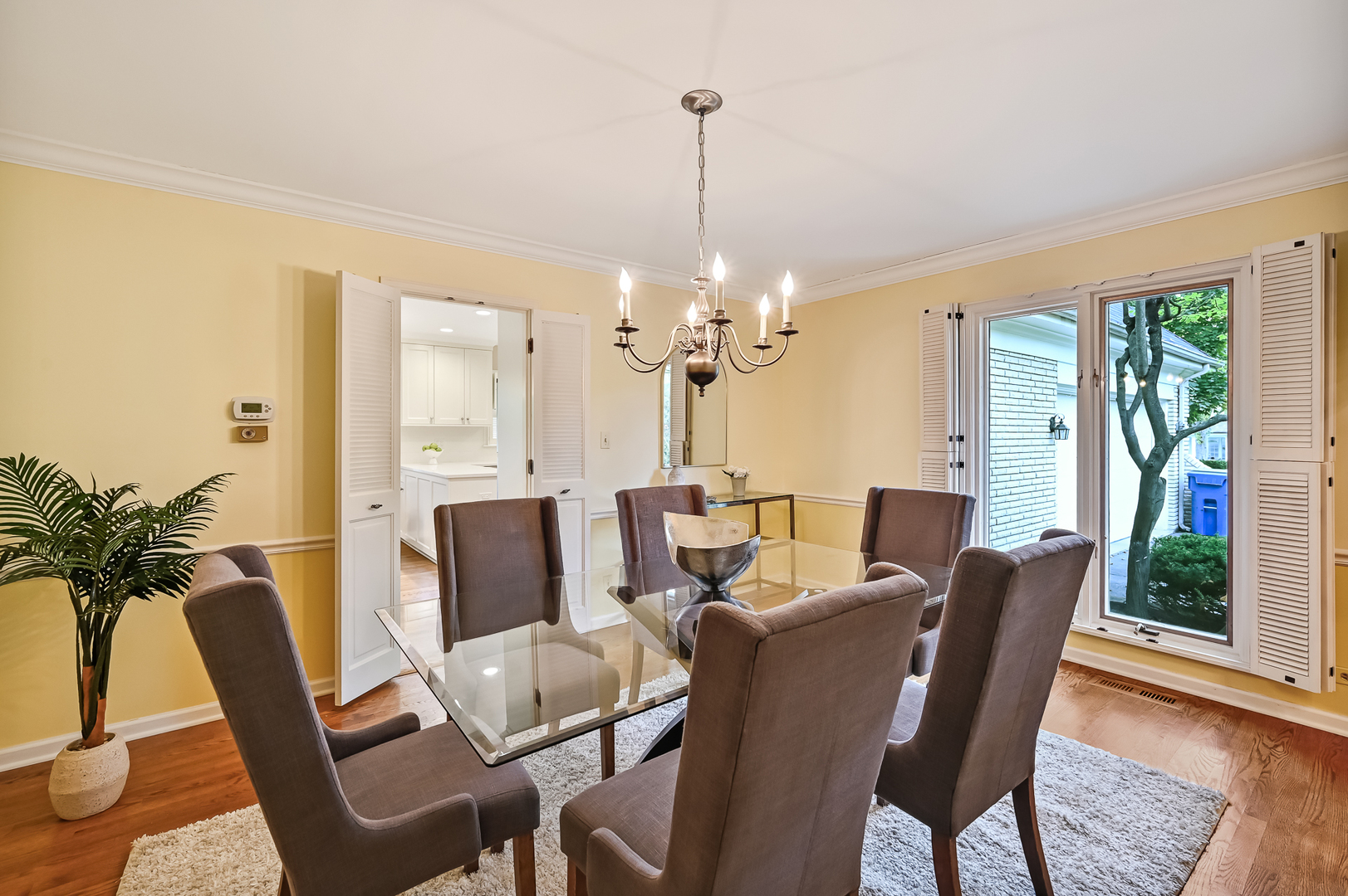 118 North Grant Street Hinsdale, IL 60521 - Photo 7 of 30 a view of a dining room with furniture window and wooden floor