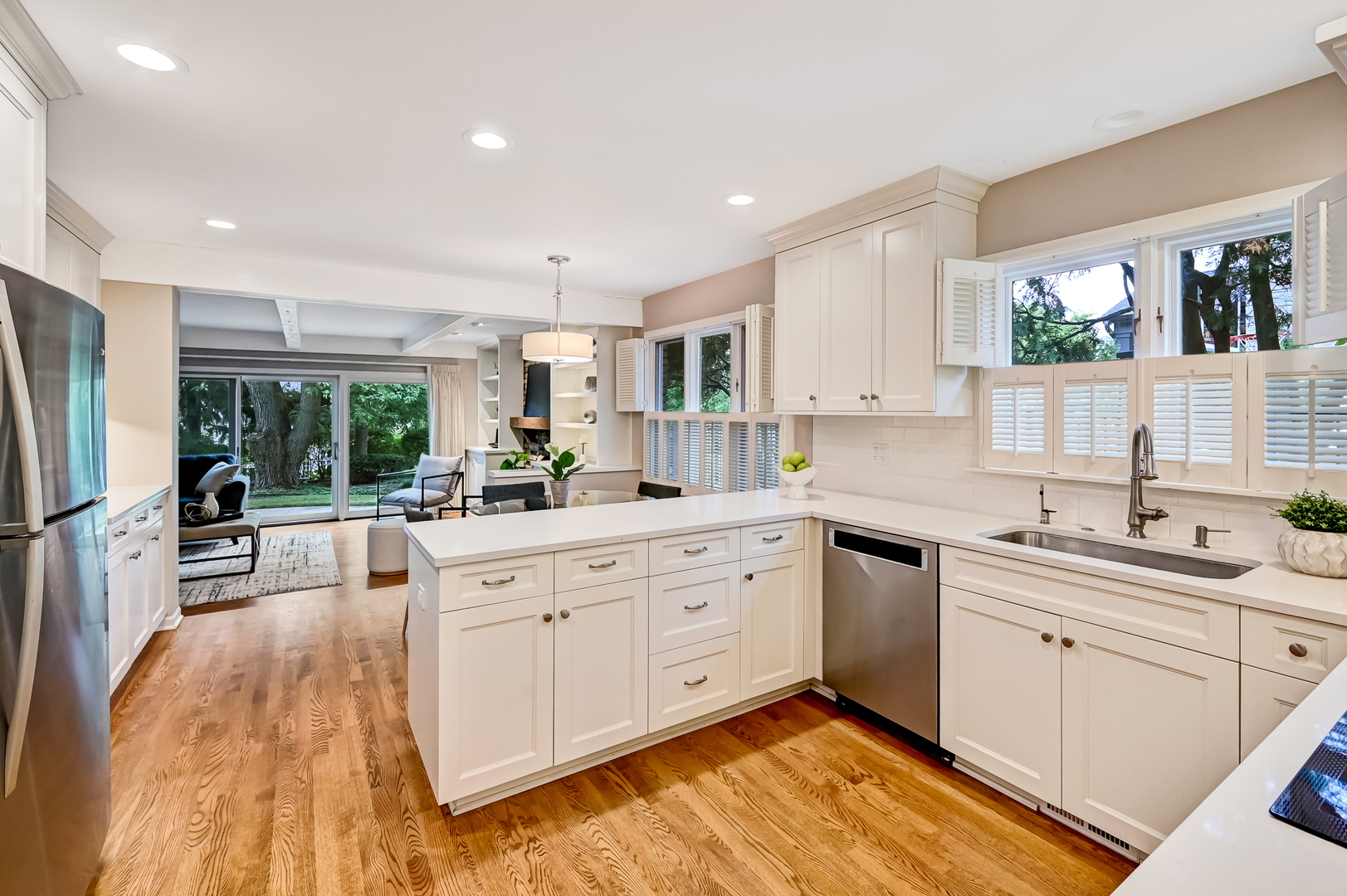 118 North Grant Street Hinsdale, IL 60521 - Photo 8 of 30 a large white kitchen with a stove a sink a refrigerator and white cabinets