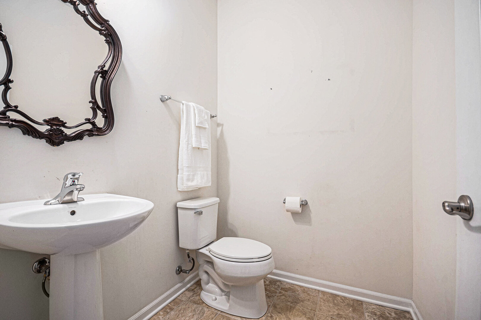 12811 Conifer Street Plainfield, IL 60585 - Photo 15 of 47 a bathroom with a sink a toilet and a mirror